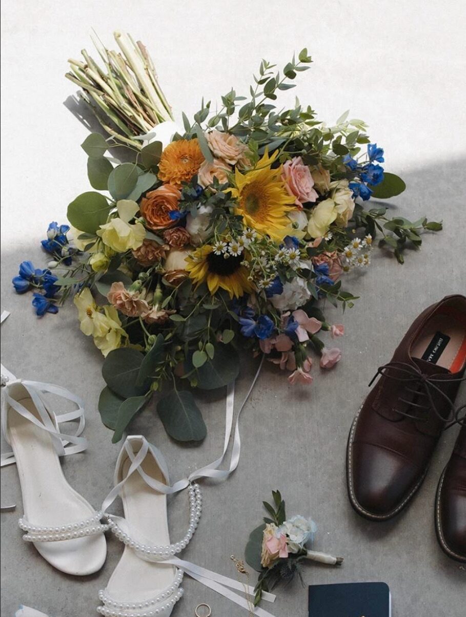 Whimsical garden bouquet with soft pastel blooms and organic greenery for an intimate ceremony